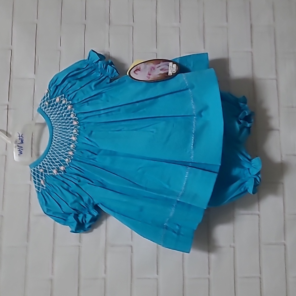 Infant smocked Will' Beth Dress with matching undies and bonnet.